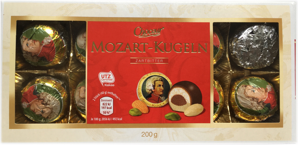 Choceur mozartovy koule s lískovým oříškem, marcipánem a pistáciemi v hořké čokoládě 200g