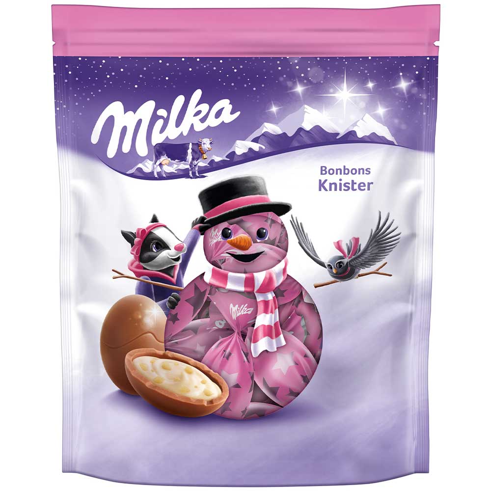 Milka čokoládové koule s náplní mléčného krému a šumivými granulemi 86g