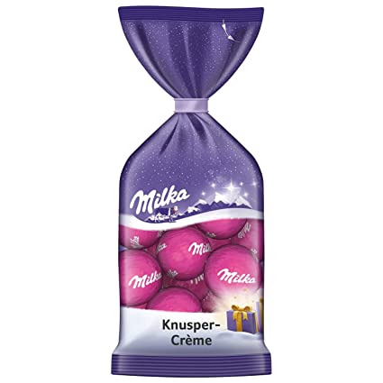Milka vánoční koule s chutnou křupavou krémovou náplní 100g-růžové